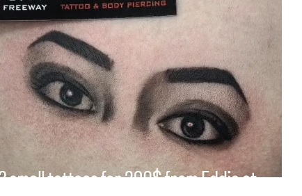 Black and grey realistic tattoo of a pair of eyes